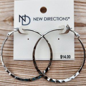 Silver hoop earrings by new direction large.